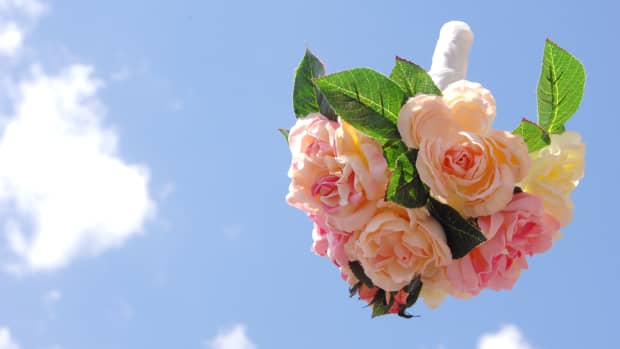 bouquet toss in the sky