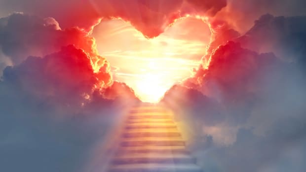 Stairway to Heaven.Stairs in sky. Concept with sun and clouds. Religion background. Red heart shaped sky at sunset. Love background with copy space.