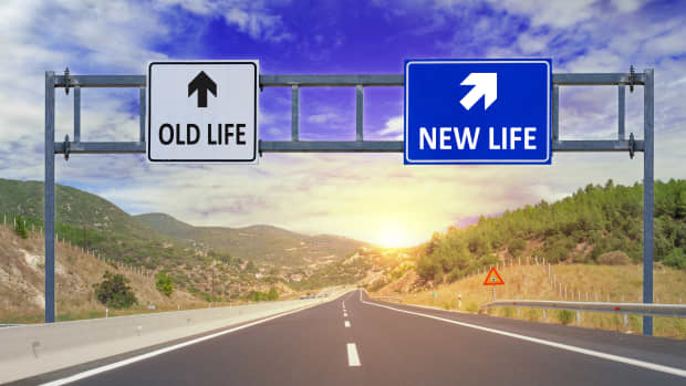 Two options Old Life and New Life on road signs on highway
